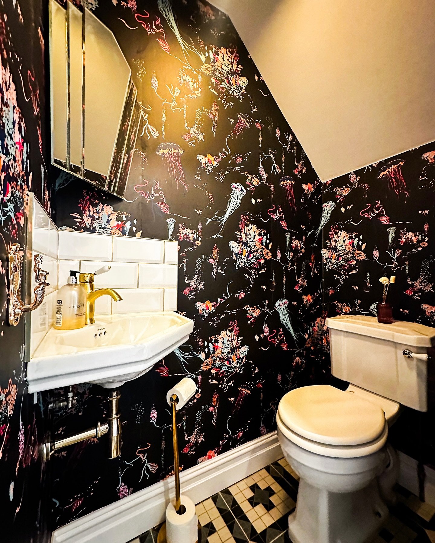 Created for a family who lived on-site during a full renovation. By reimagining an unused space, we added much-needed function without compromise; a level tiled floor throughout, corner fittings that make every inch work, and a design bold enough to 