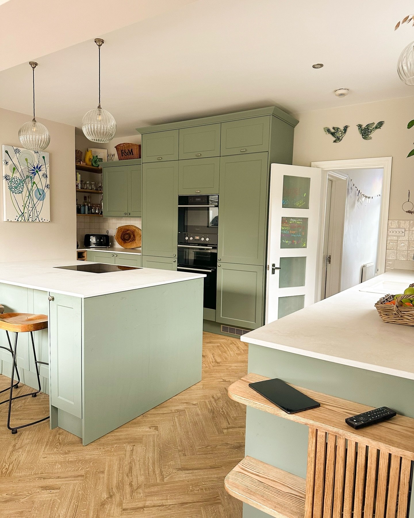 Soft green cabinetry, matte stone&nbsp;worktops&nbsp;and ash detailing give this kitchen its character.&nbsp; Everything was chosen to feel calm and lived in, not polished or perfect. The finishes are tactile and understated, made to be used every da