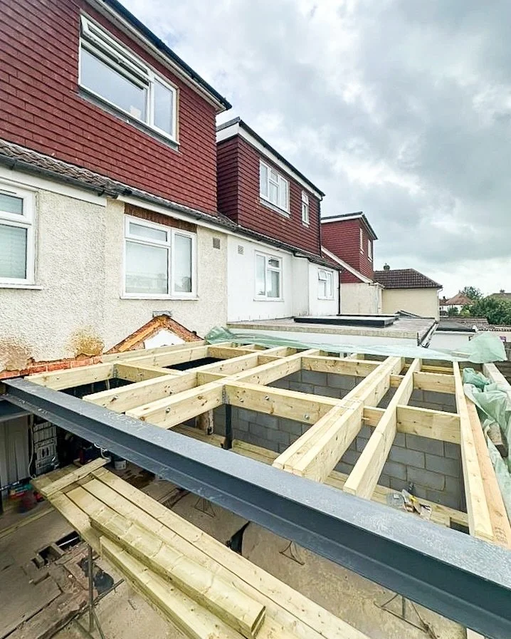 This kitchen sits inside an extension we built, planned from the ground up around how the space would be used. Ducting for the downdraft hob was set in place before the insulation went down, underfloor heating was designed with flooring in mind, and 
