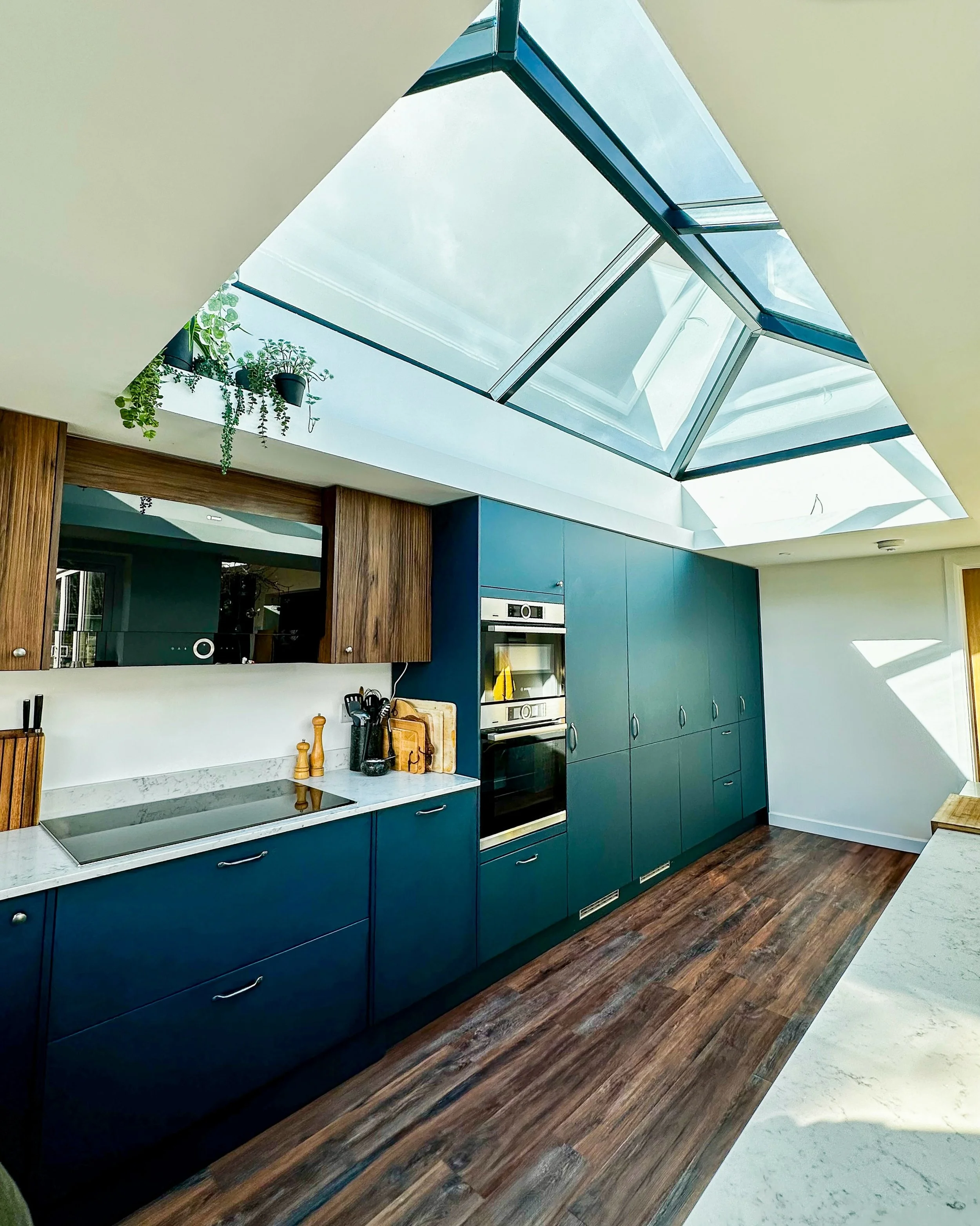 Hangleton Valley Drive in Hove was fully reworked to create a home that better supports the pace of modern family life. The original layout felt disconnected, with the kitchen positioned at the front of the house, limited bedroom space, and little na