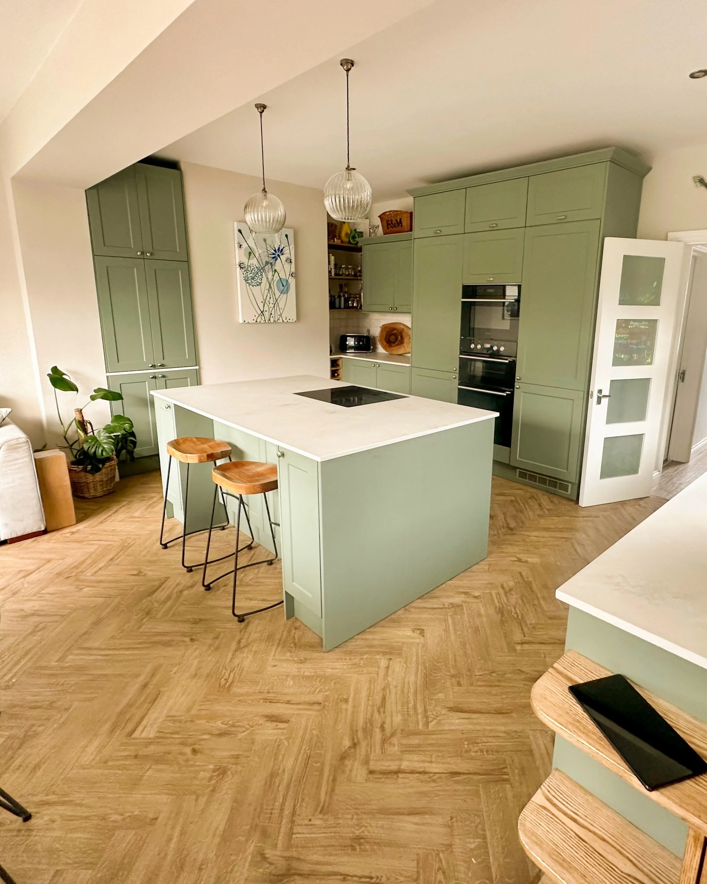 Grinstead Lane in Lancing was fully reworked to create a home that better supports the pace and flexibility of modern family life.

The original layout felt restrictive, with disconnected kitchen and dining spaces, limited storage, and a structural c