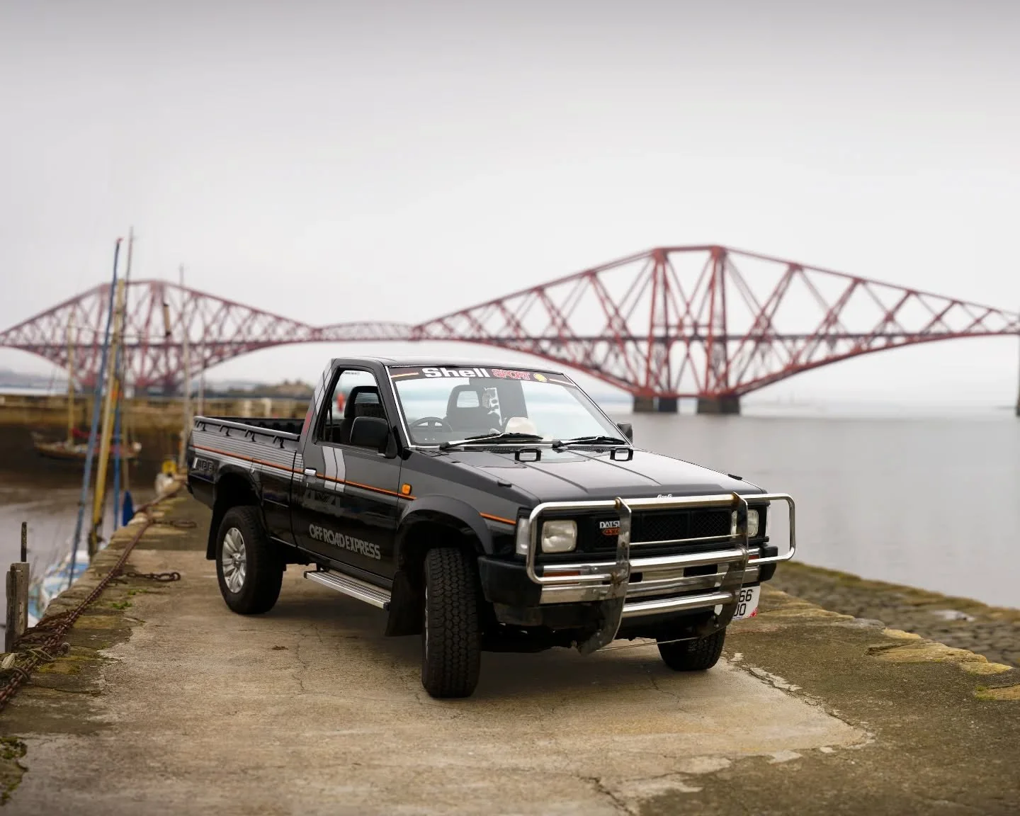 Same iconic backdrop, completely different era of engineering! Got the opportunity to photograph Lewis's awesome Datsun D21 down by the Forth Rail Bridge. Swipe to see the details on the badge and the cockpit! 🤠

Cars Owner: @lewisjohnstone58

#Dats