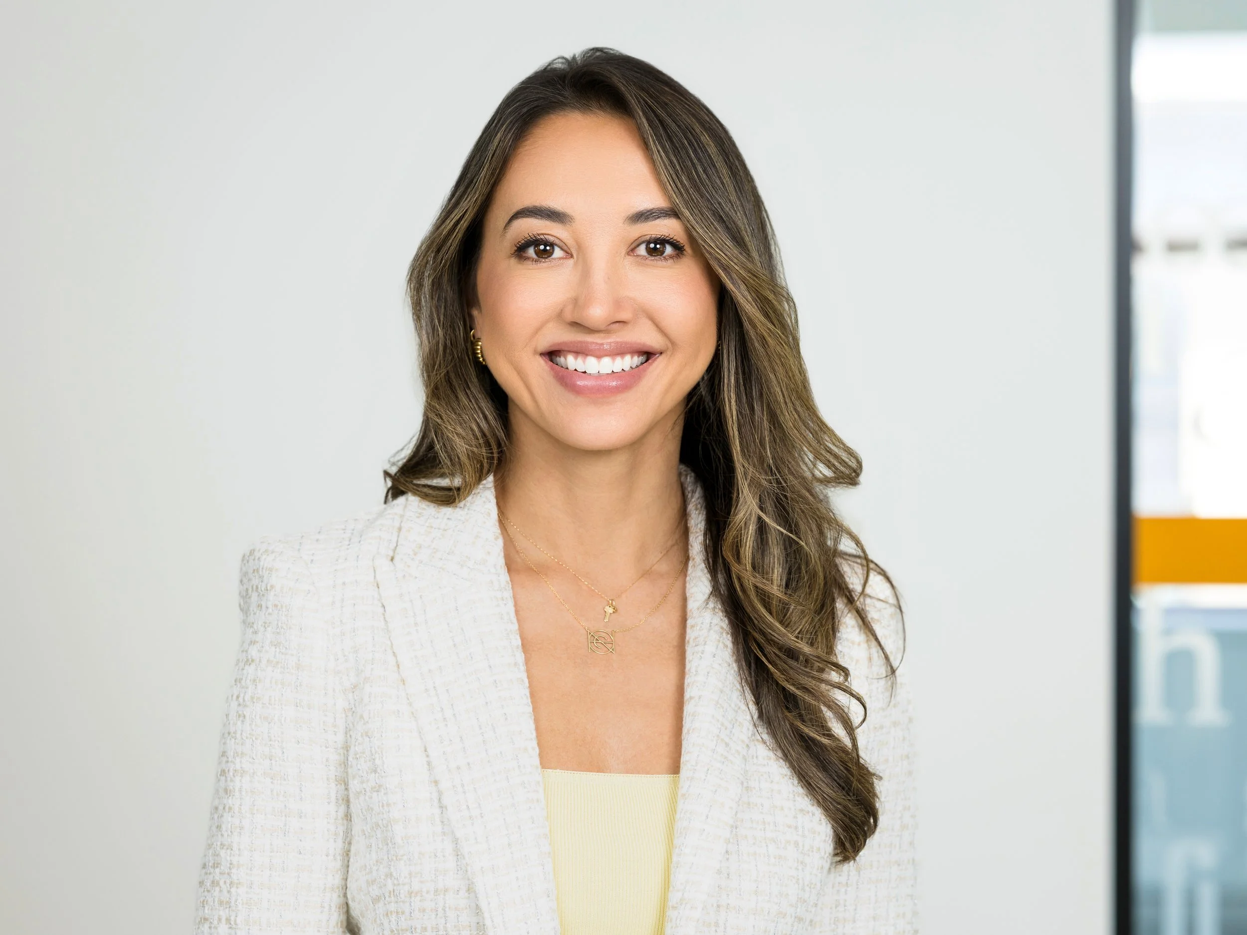 Corporate Headshot of Woman with Brown Hair in Office