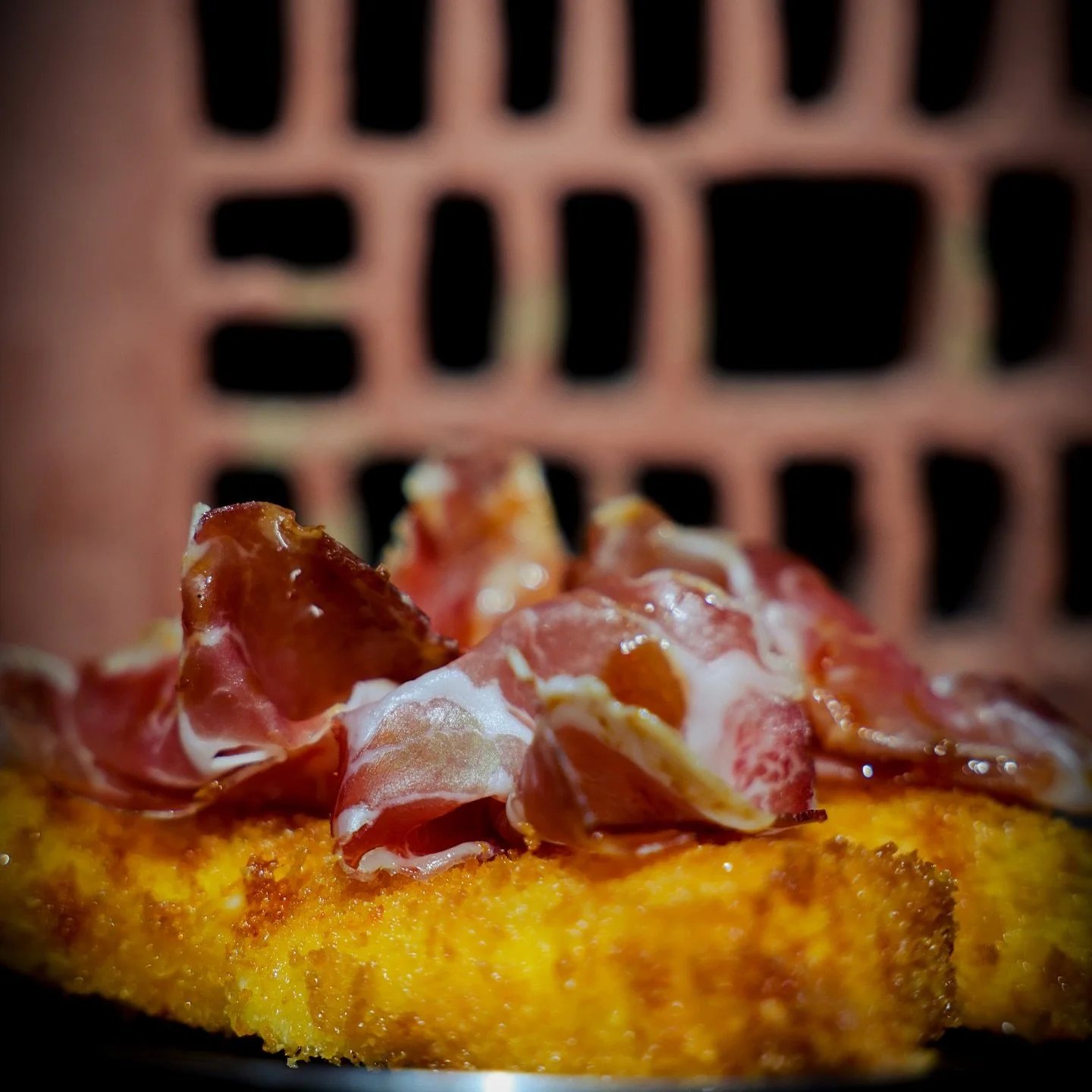 Comfort food is what we do best. Crispy Love Me Tenders made of cheesy scamorza turned into big fries, spicy jam for the heat lovers, and thin sliced Coppa di Parma to finish it off. Simply irresistible.