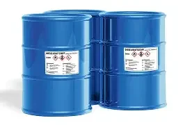 Large format A4 size GHS hazard labels printed on the side of a drum