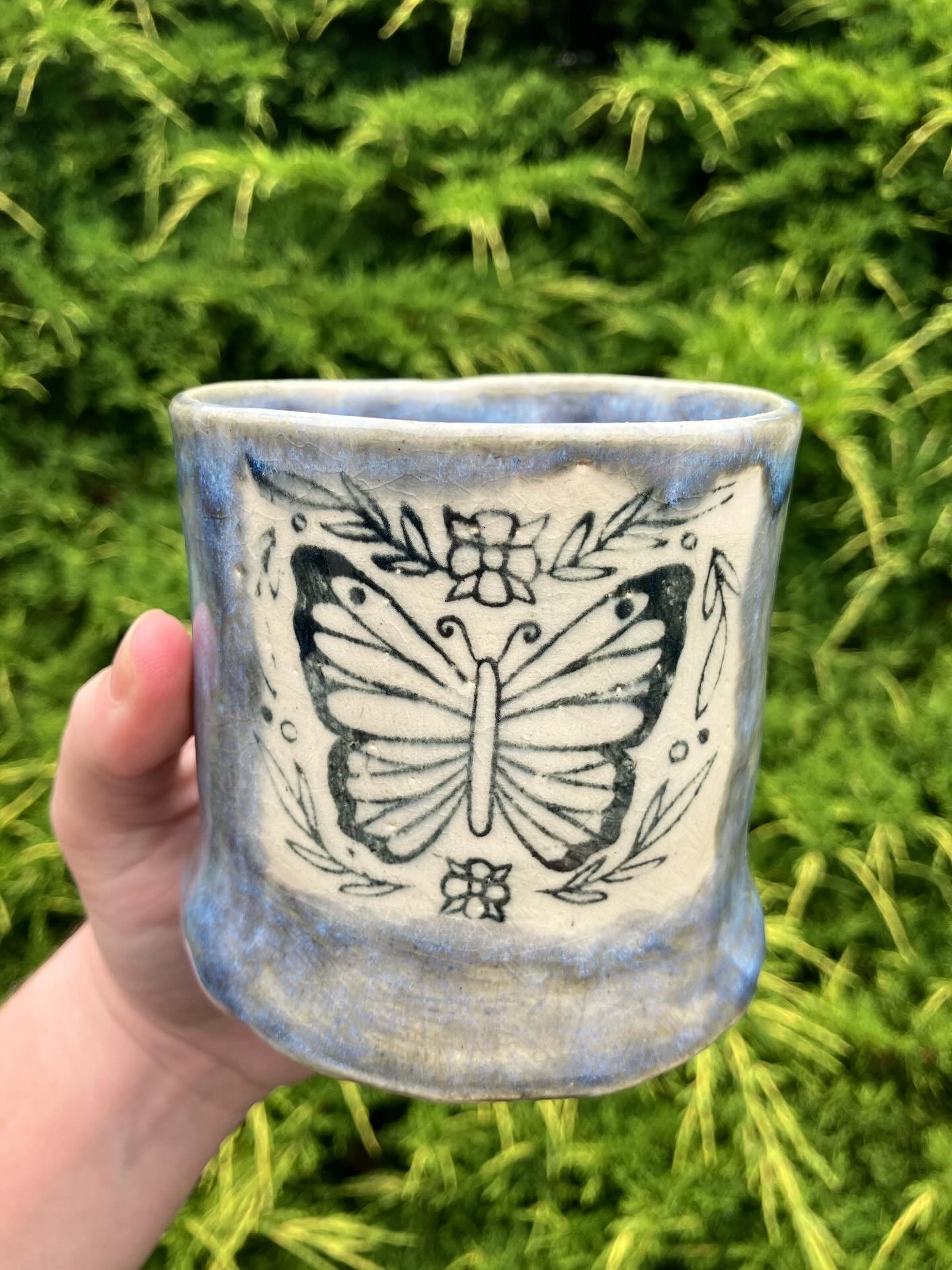 A tester butterfly image from when I was obsessing over diy transfers. This is the one that worked the best &mdash; silk screen medium thickened black glaze applied directly on bisqueware. I honestly love it SO much!! Probably gonna stick to the comm