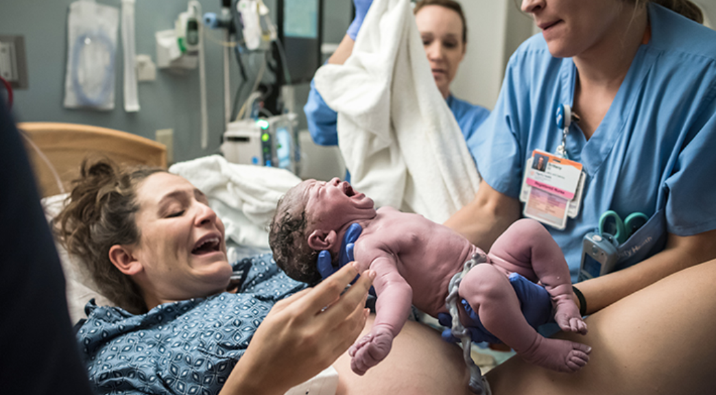 Woman giving birth
