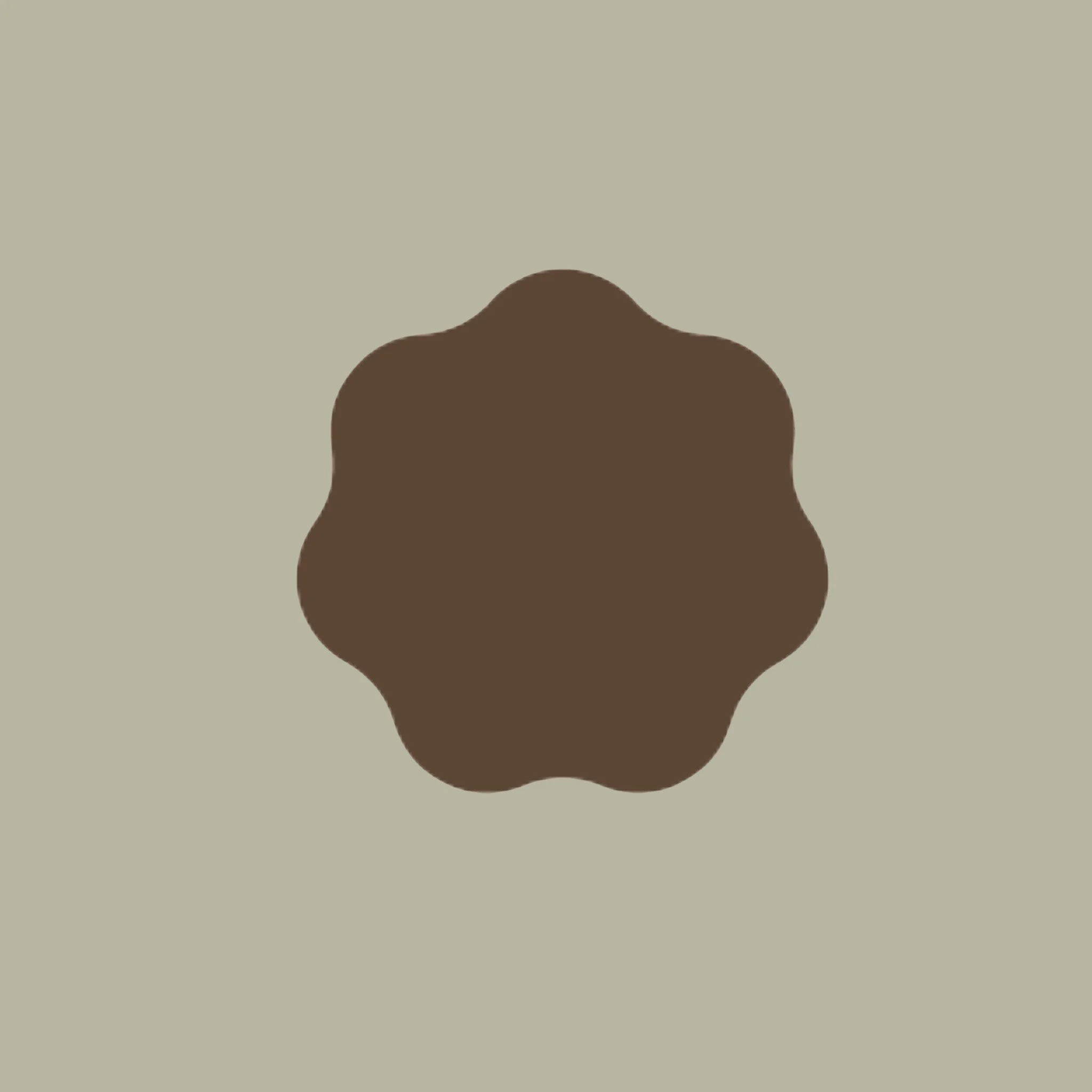 A symmetrical, rounded brown shape on a light tan background.