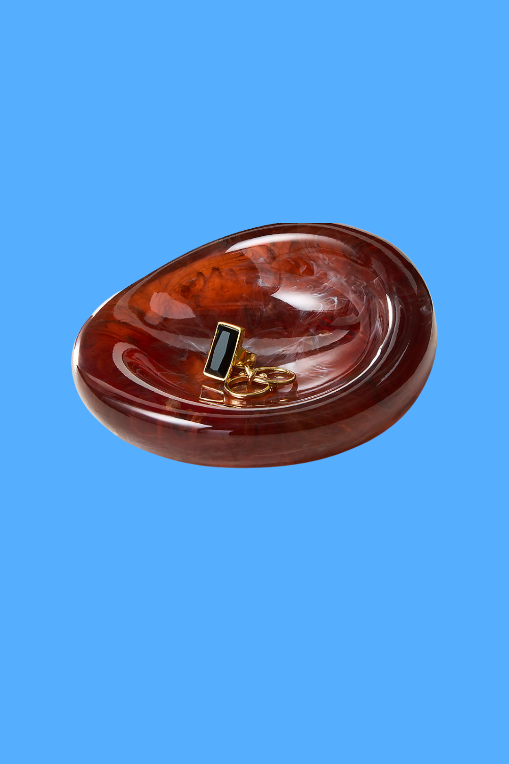 CB2 Swirled Resin Catchall · $39.95
