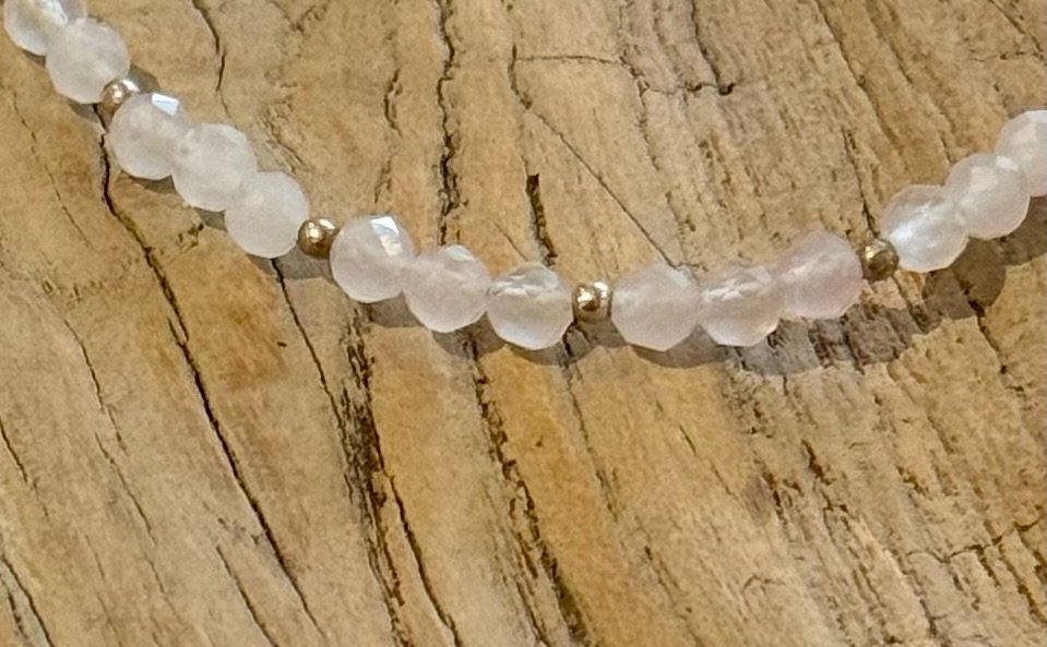 Wilma Rose Quartz Faceted Beaded Toggle Bracelet Close Up Wood.jpeg