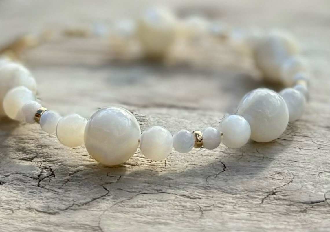 Emma Mother Of Pearl Bubble Beaded Toggle Bracelet on Wood.jpeg