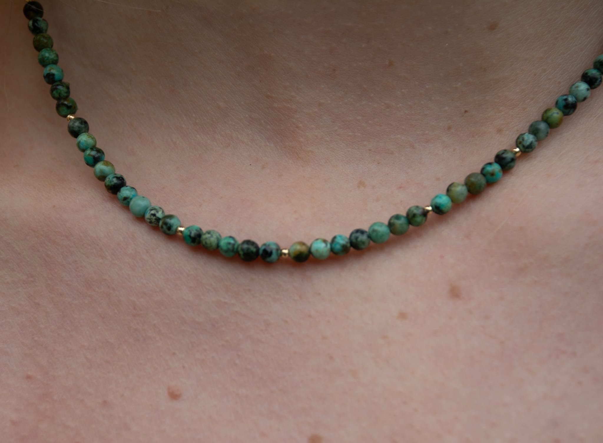 LAURA+AFRICAN+TURQUOISE+BEADED+NECKLACE+ON+NECK.jpg