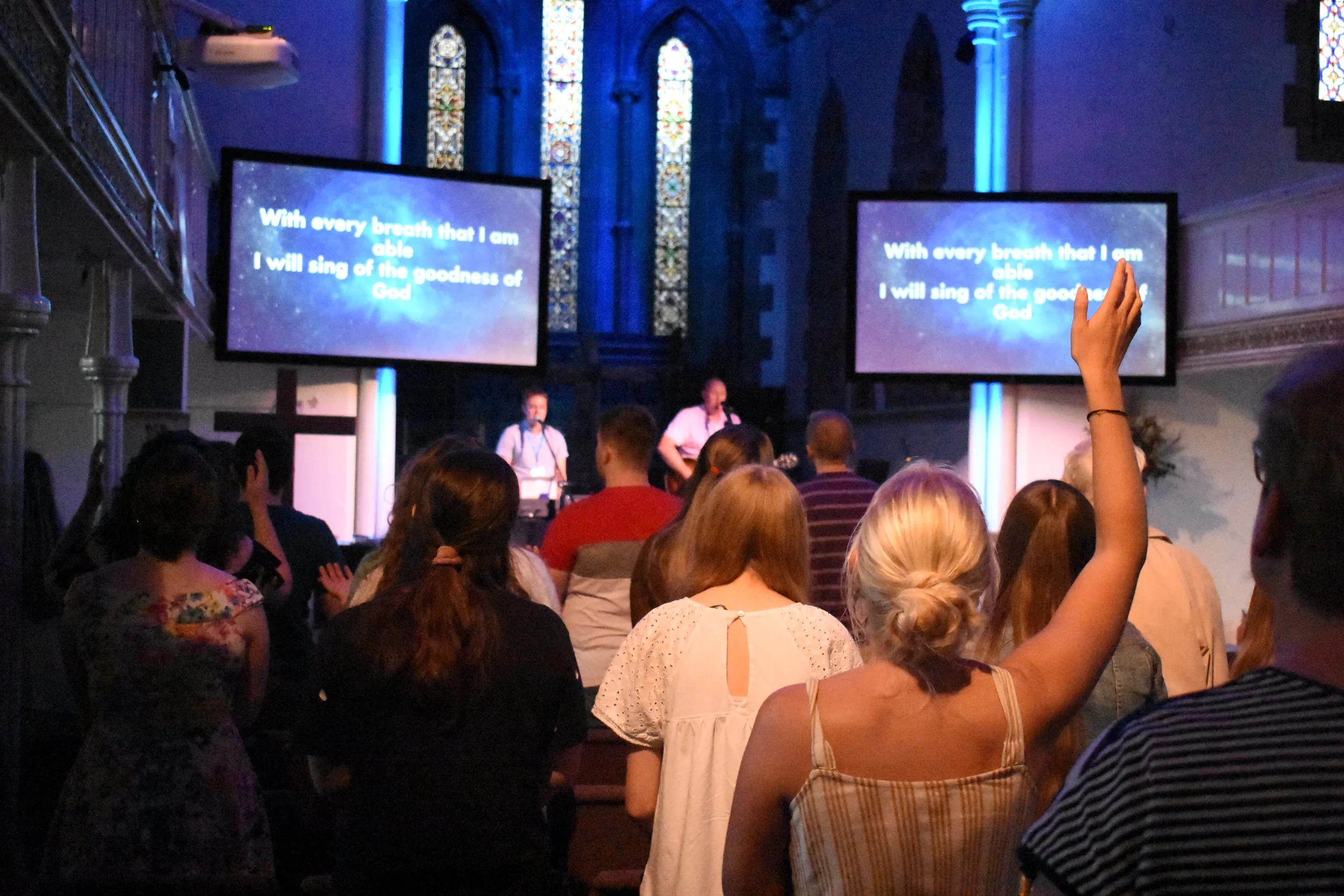 Cong Worship hands raised 7pm.JPG
