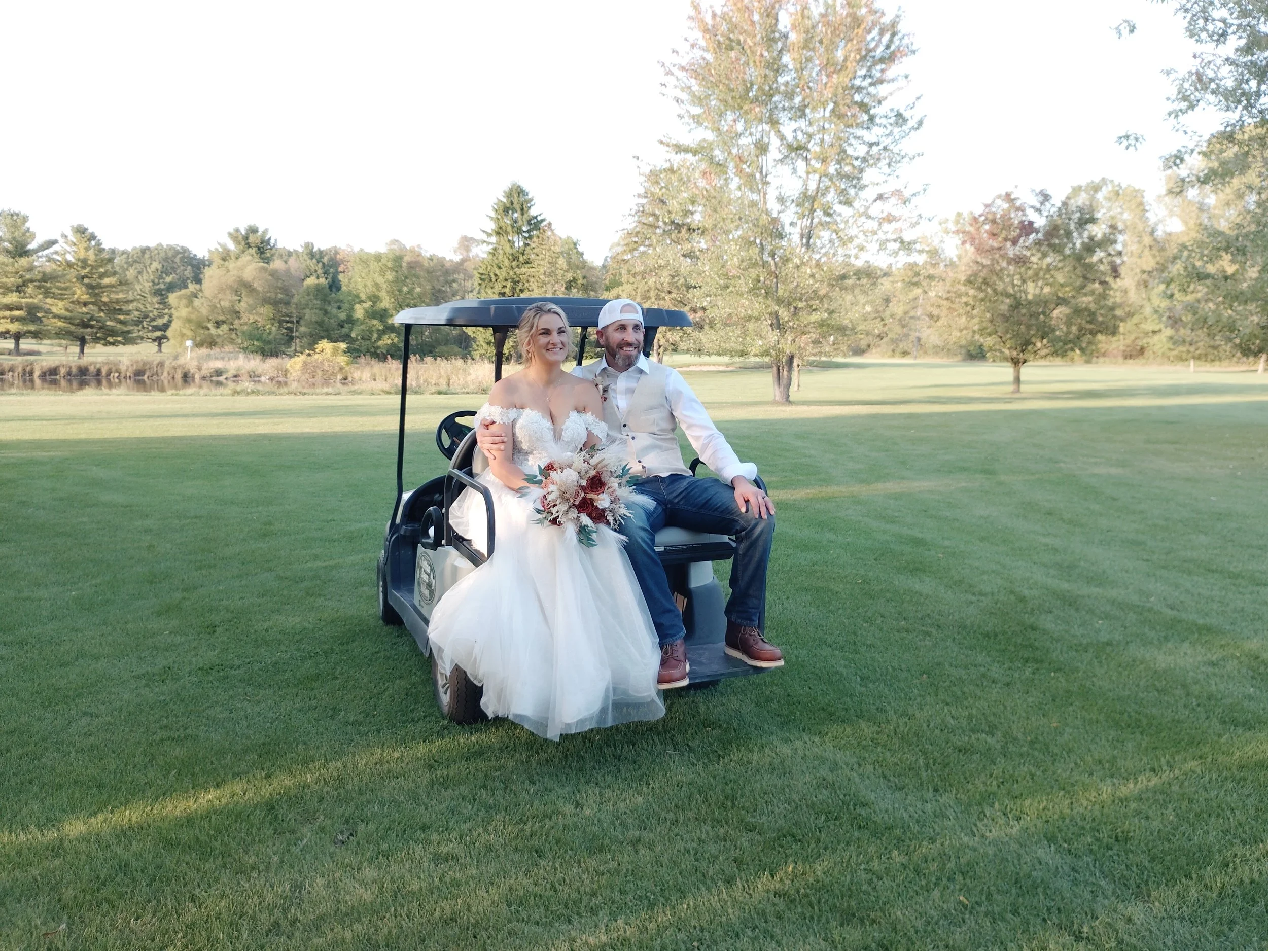 chelsea adam golf cart.jpg