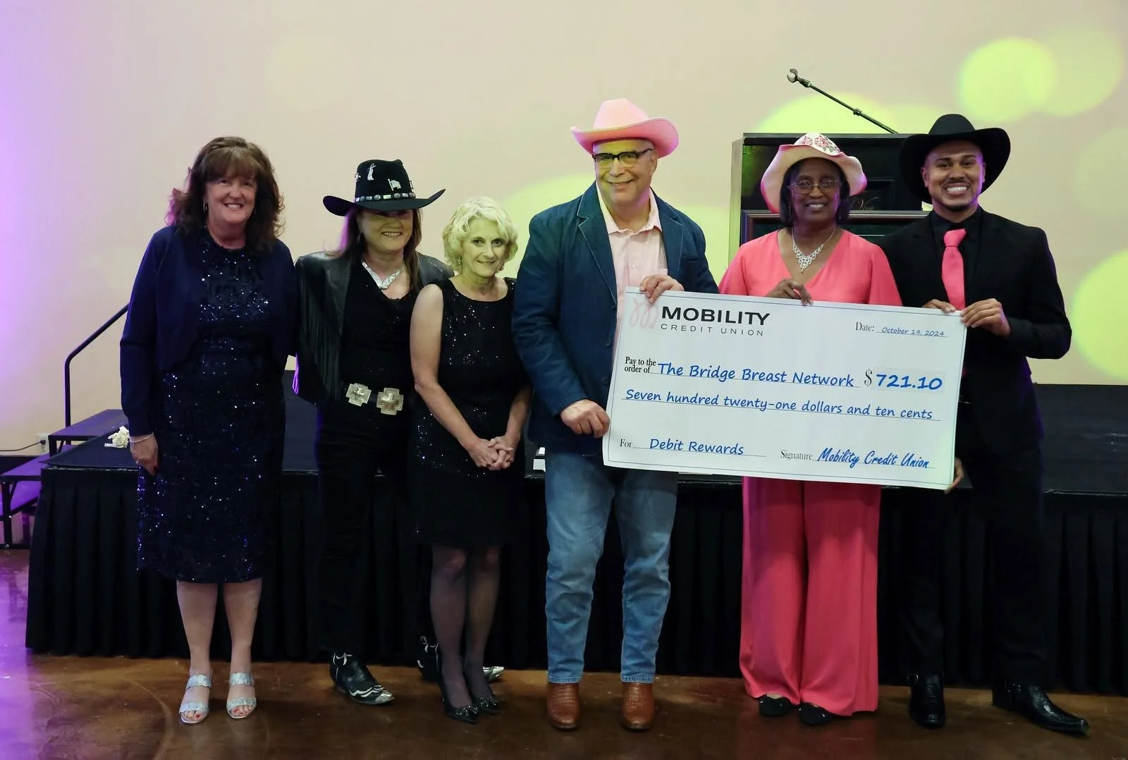Check Presentation to Bridge Breast Network