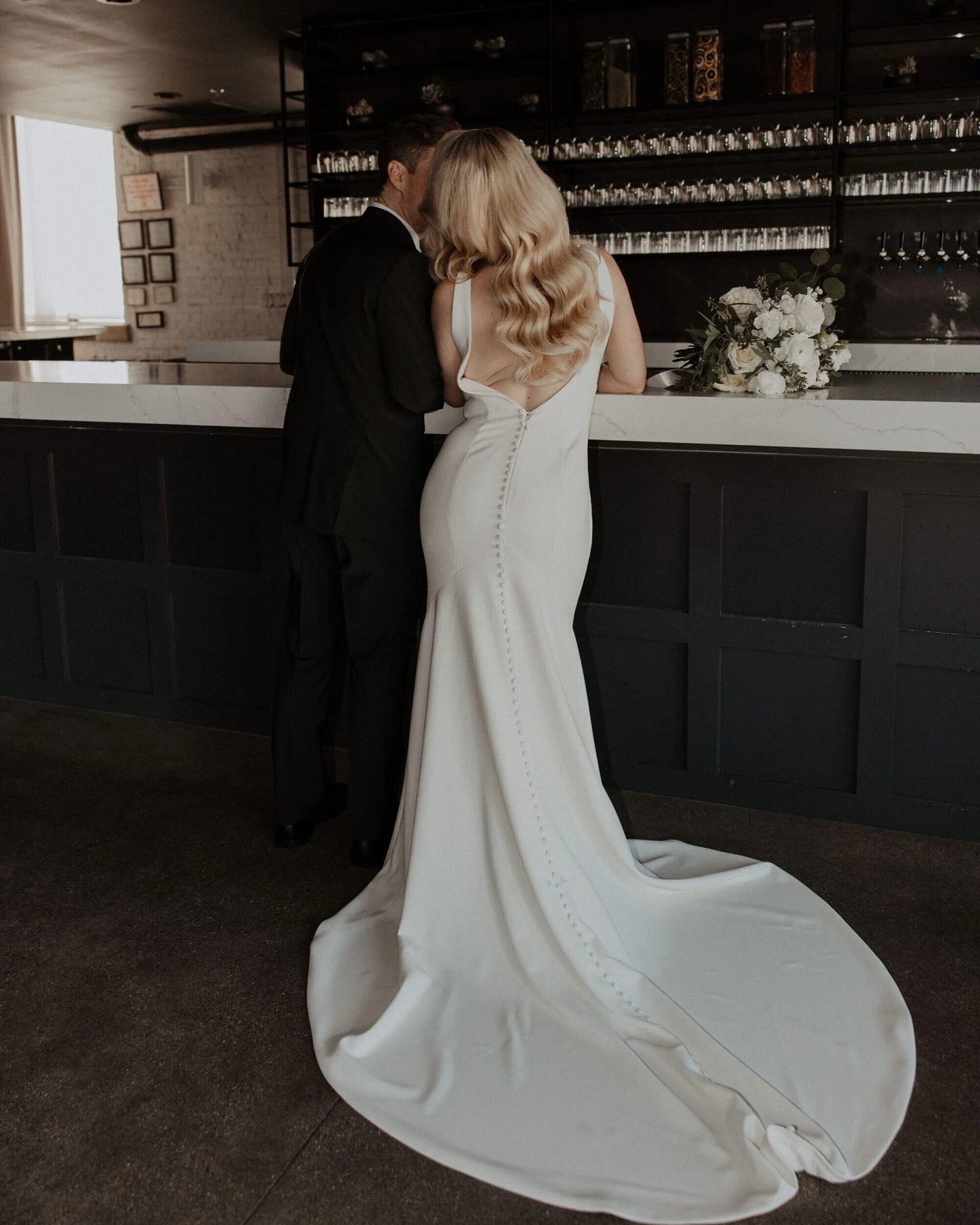 A Polar Vortex couldn't stop Julie and Jimmy's winter wedding at Walden! ❄️ Their cozy white and sage green palette brought warmth and light to their ceremony and reception, making the industrial two-story venue even more intimate.

We're already boo