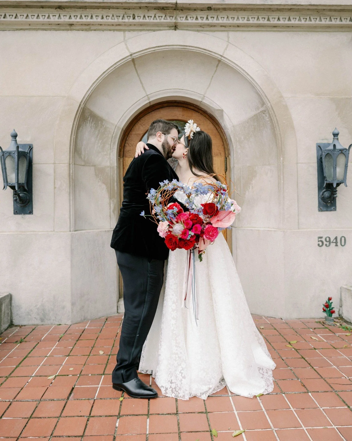 #WeddingWednesday: We'll never let a Valentine's week go by without highlighting this fun and colorful heart-shaped bridal bouquet we put together for Alex and Jonathan.

Inspired by 1980's prom vibes, their wedding was full of burgundy, red, and pin