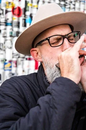 BAD BRAD WHEELER playing harmonica