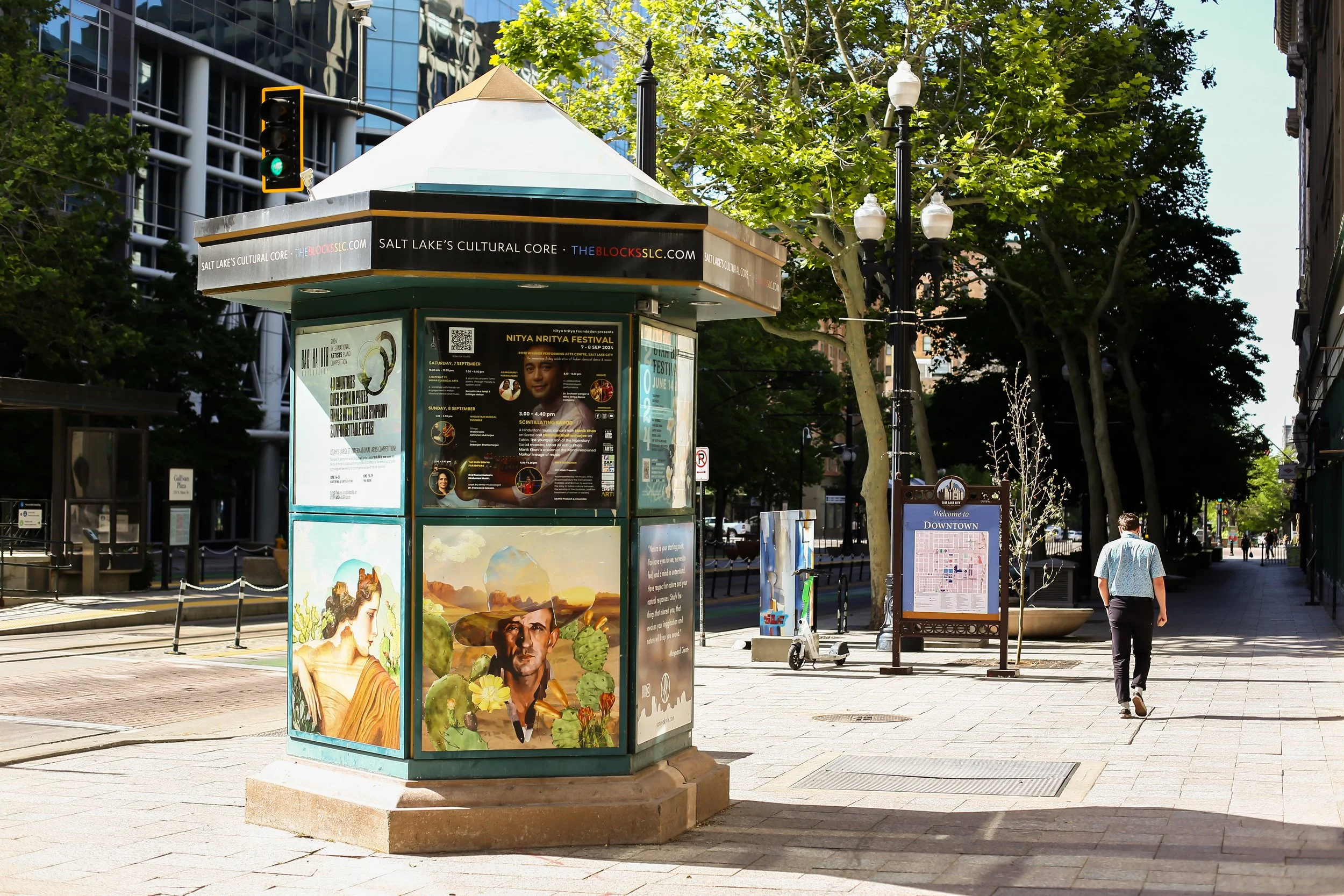 Kiosk on Main Street in Downtown SLC with posters
