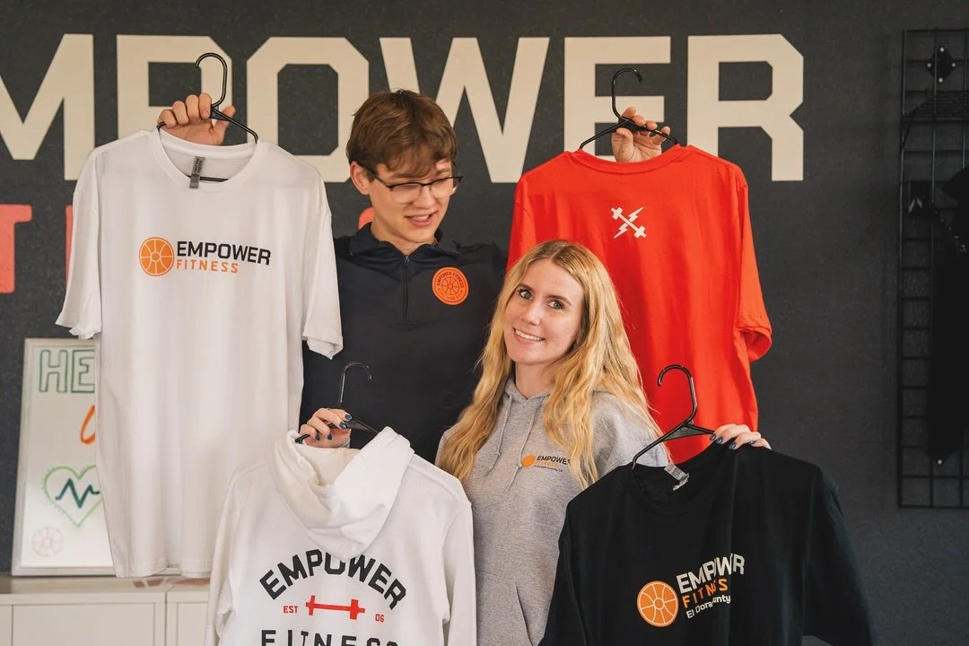 Get merch and get happy 🤗 We&rsquo;ve got Empower Fitness Tees, quarter zips, hoodies and hats! Stop by the gym and pick up some happiness ☀️