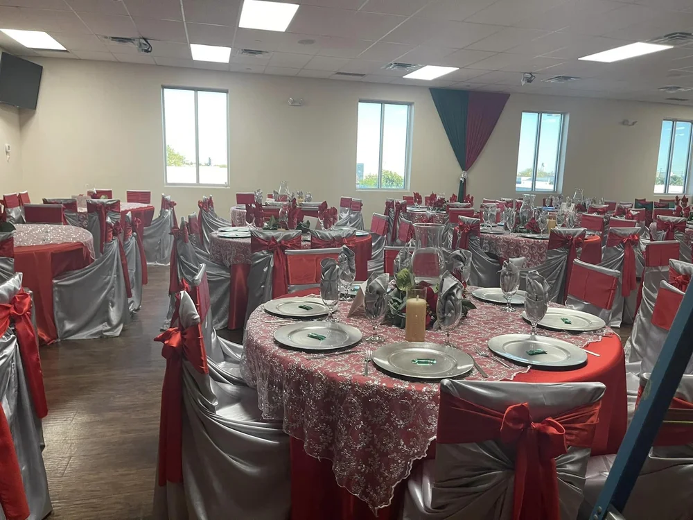Elegant gold and blush themed event setup with draped centerpieces by Unique Creations Plus