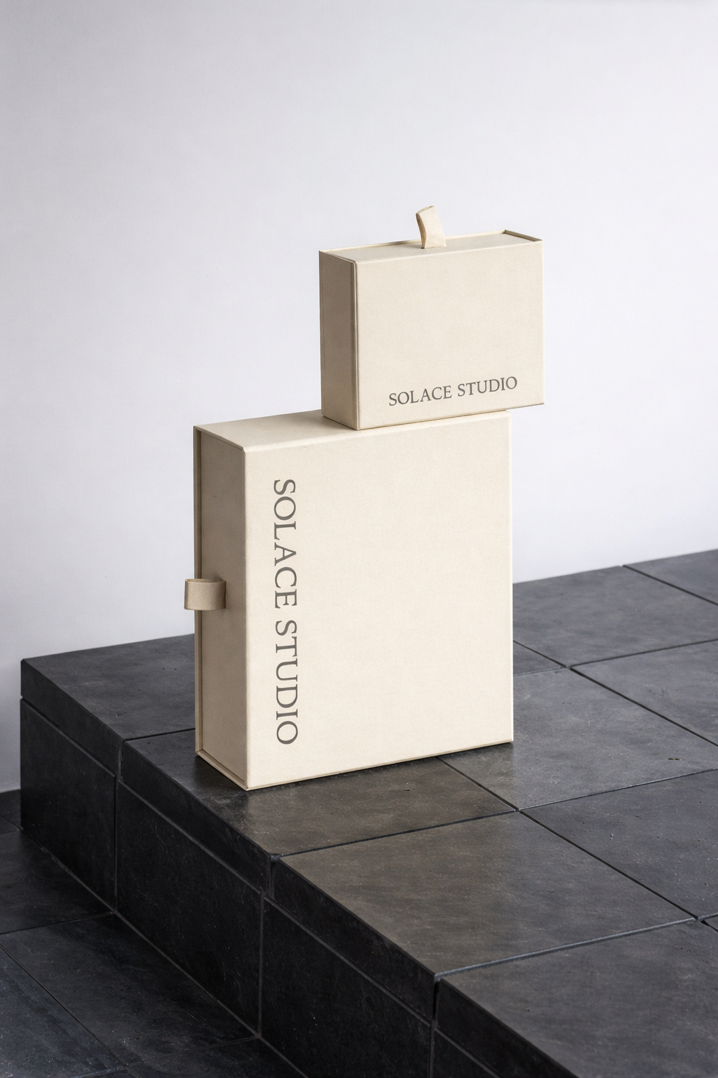 Elegant SOLACE STUDIO packaging boxes.png