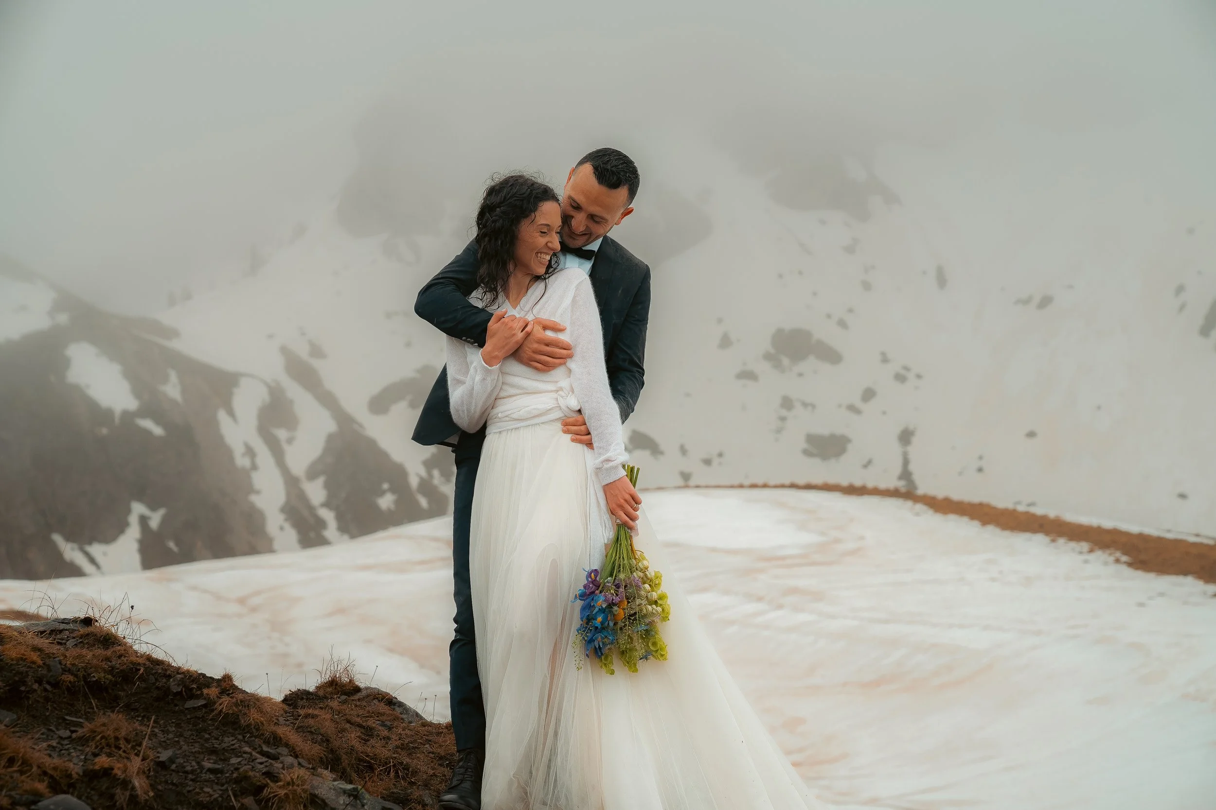 snow elopement couple