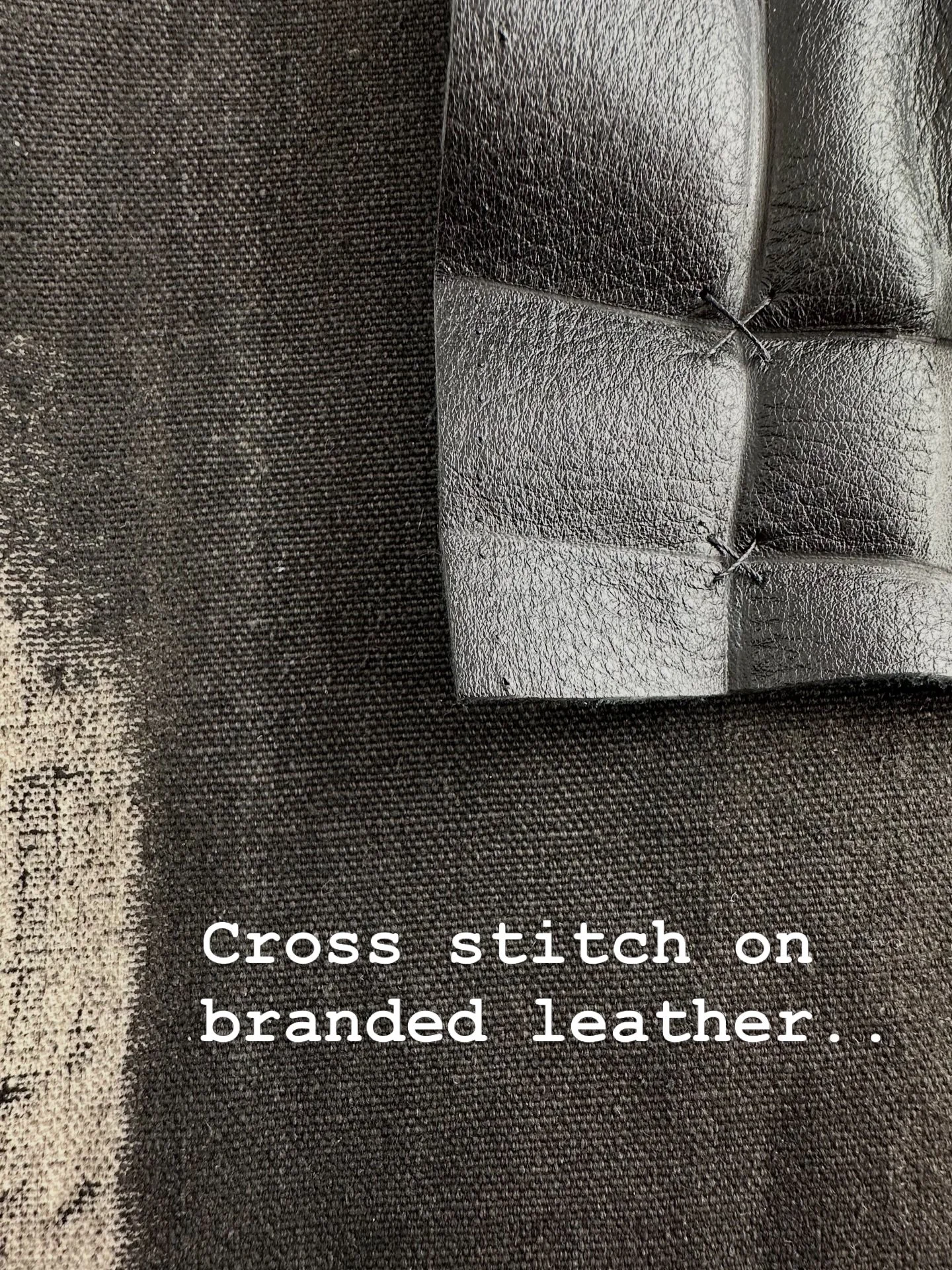 This was an interesting experiment. I used an espeto to burn welts in the leather and then stitched crosses using an upholstery needle and thread. #leatherpillow #upholster#blackleather#paintedcanvas#noir