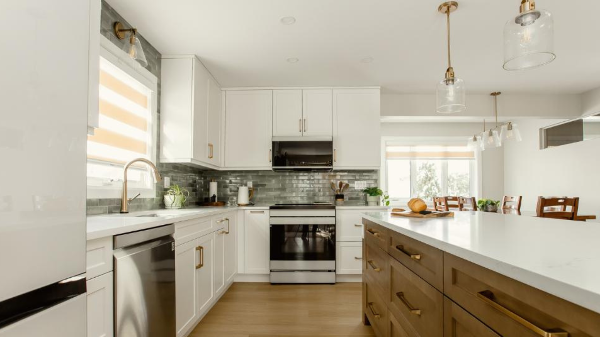 Bright white kitchen with warm wood island and classic finishes, illustrating a timeless home design that avoids fast-moving interior trends.