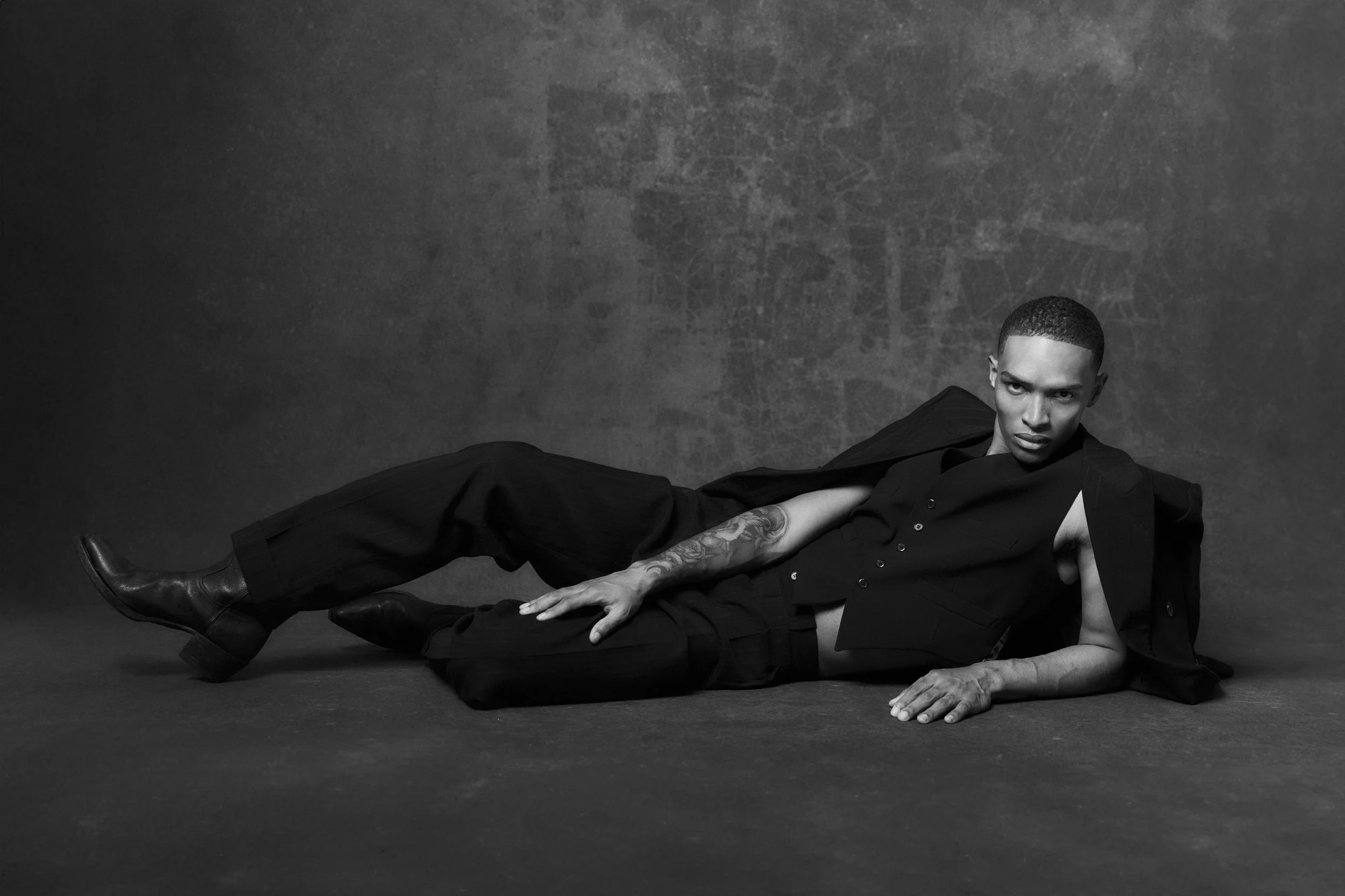 Featured image shows a black hand-painted backdrop rental. The model is posing for an editorial photoshoot for FASHION Canada magazine. Photography Wade Hudson. 