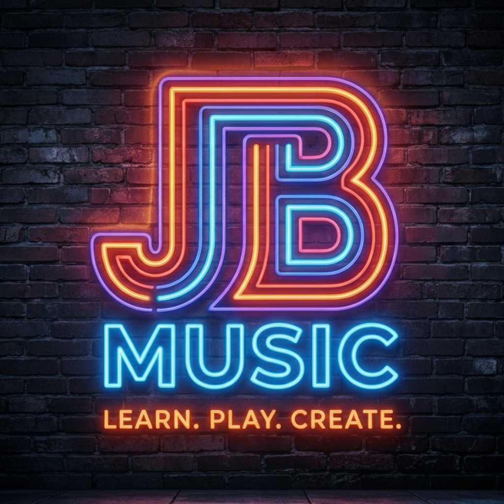 Neon sign with large letter 'J' and 'B' overlapped, with the word 'MUSIC' below and the phrase 'LEARN. PLAY. CREATE.' at the bottom, all glowing against a dark brick wall background.