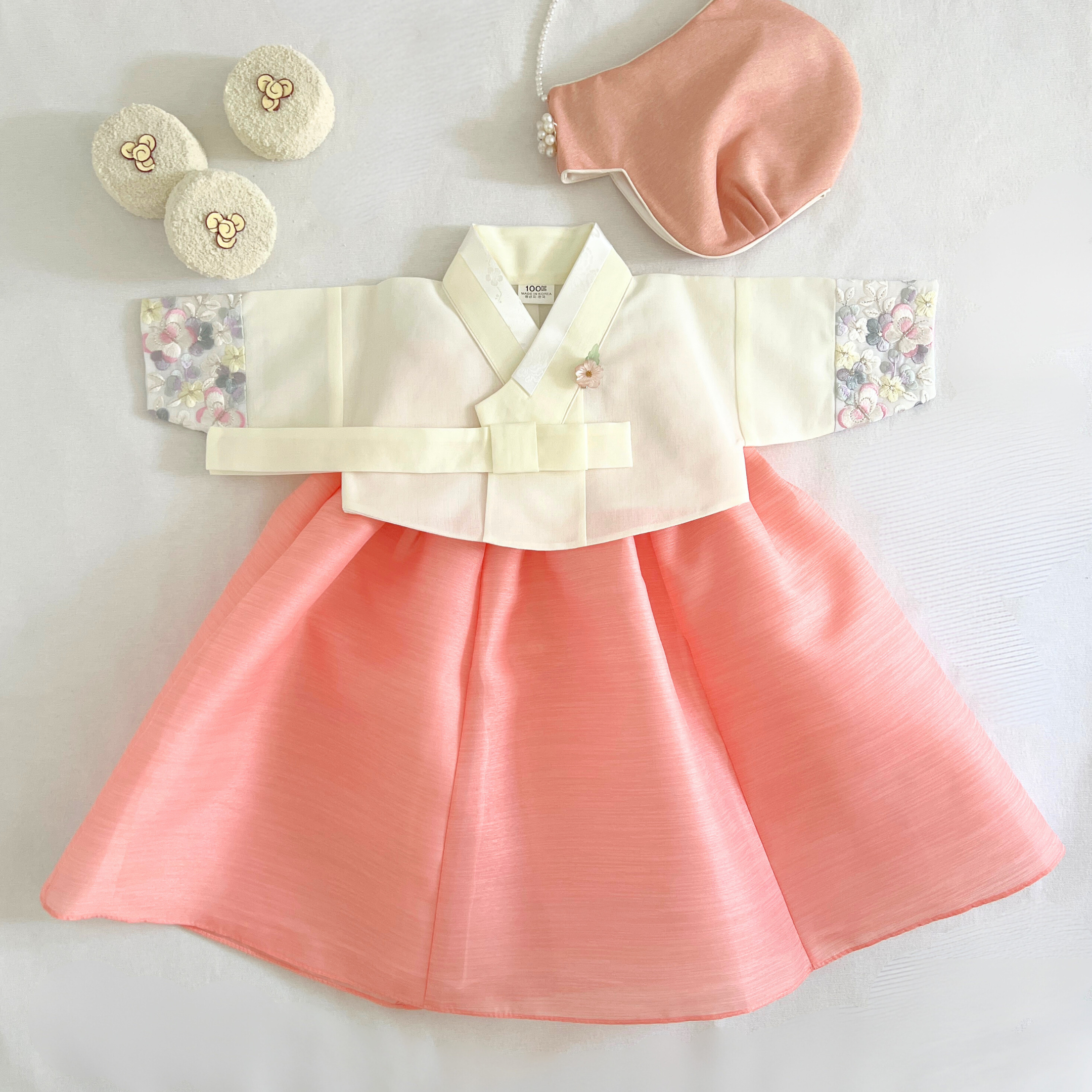 Image of a girls coral pink hanbok