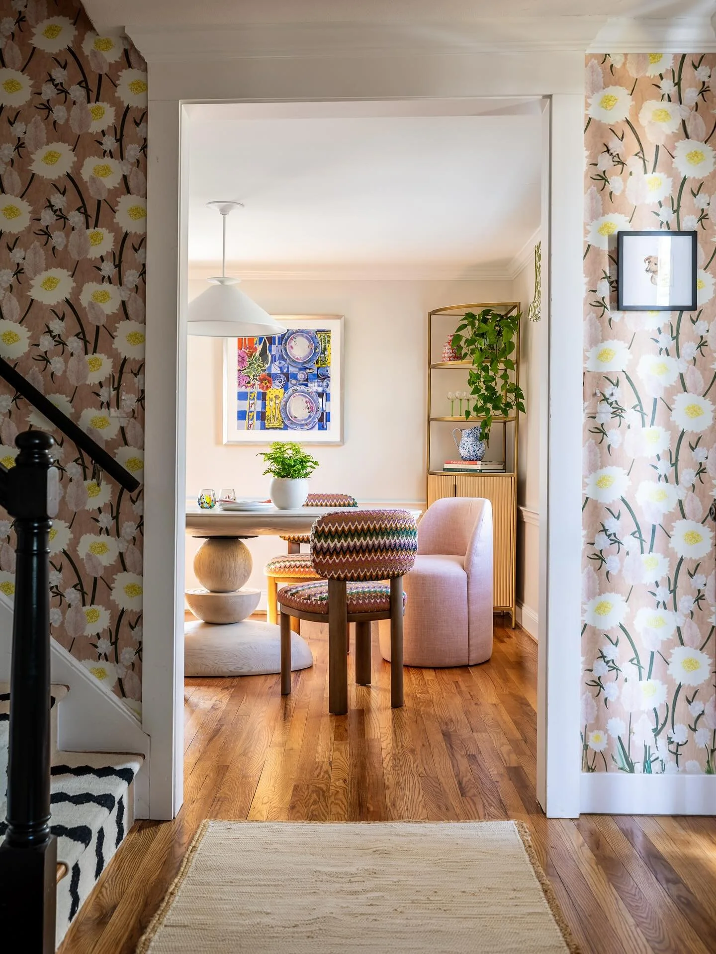 Three views of this gorgeous wallpaper from @louise.jones_ 🌸

1️⃣ I love the bold, geometric stair runner paired with the floral wallpaper &ndash; sweet, but not too dainty. 
2️⃣ The foyer and stair hall is a connector between the living and dining 