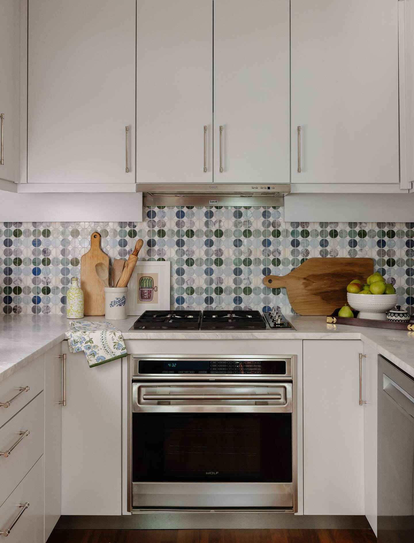 Natural stone, always! Marble has been used as a building material for thousands of years, and it&rsquo;s my favorite material for kitchens and baths. This marble mosaic backsplash was one of the first design elements we picked for this project &ndas