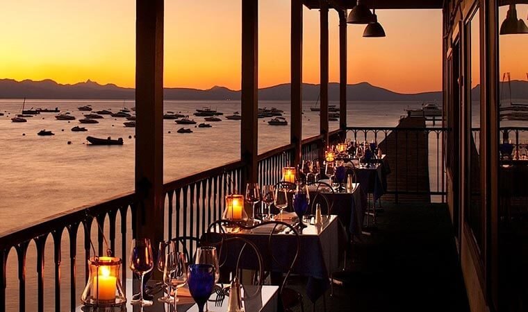 Nearby restaurants and outdoor firepits right up the street from Bluebird Day Inn in South Lake Tahoe, CA. Beautiful sunset.