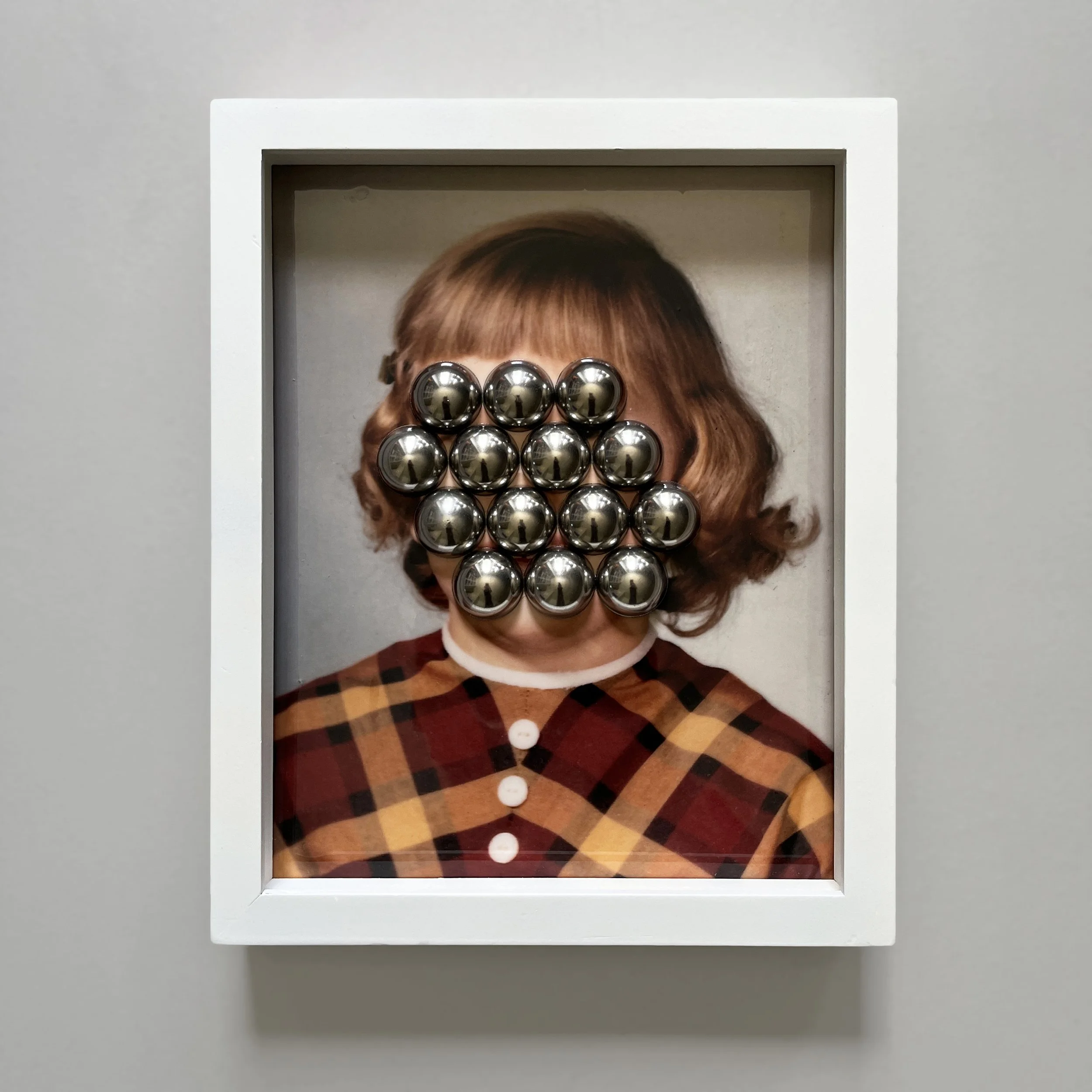 2022.02 (Looking at You, Looking at Me), polished steel with photography, 11 x 9 inches. 