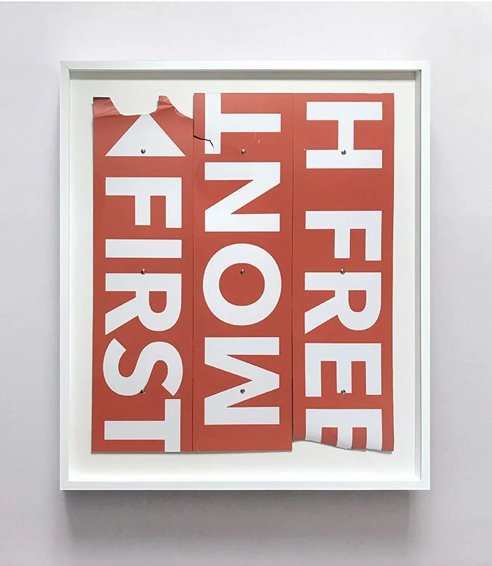 2021.02 (First Month Free), found signage, bolts, 36 x 31 inches. 