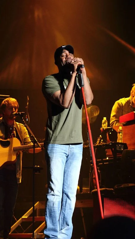 A photograph of Darius Rucker performing on stage in 2012