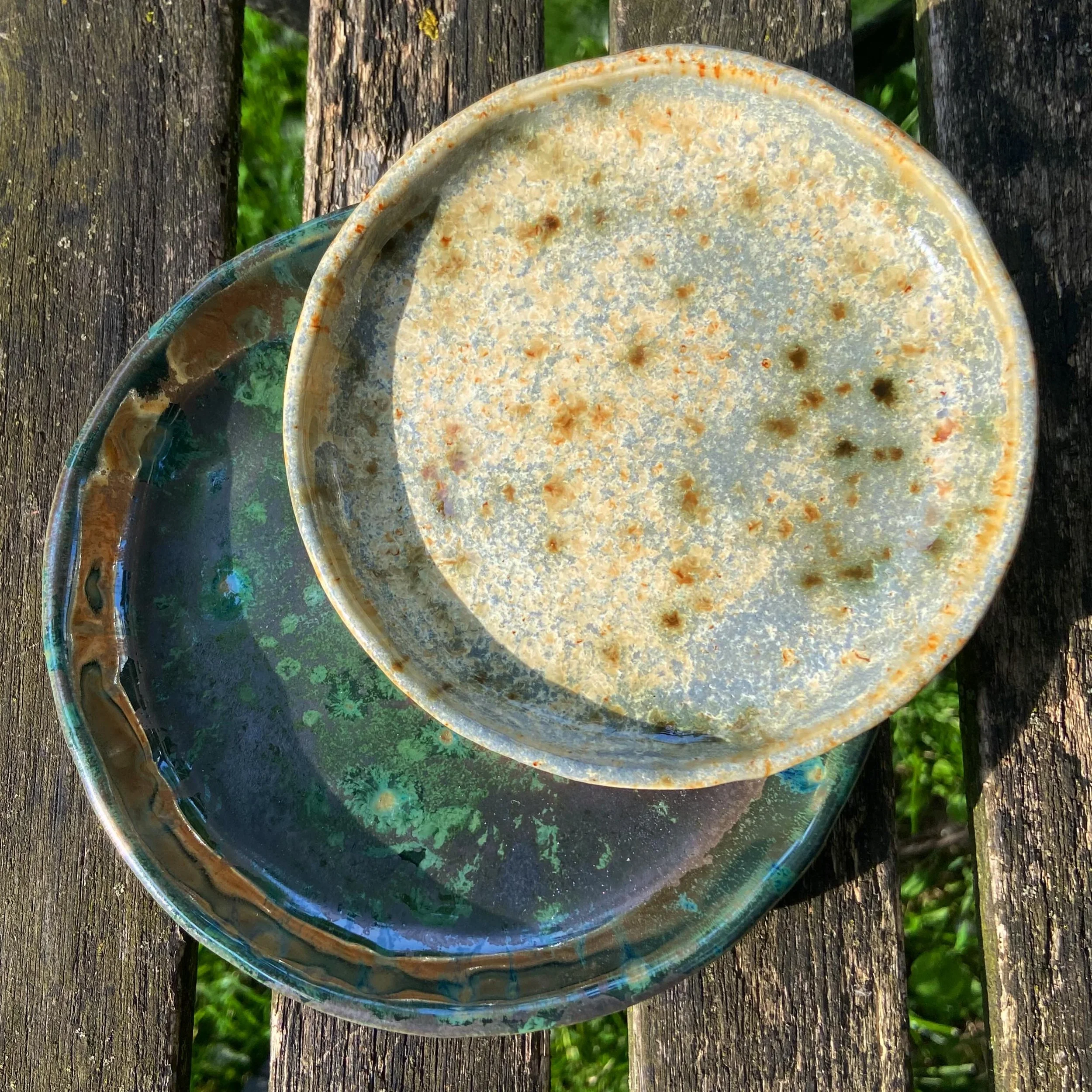 I&rsquo;ve been making PLATES for the past little bit! 3 sizes (2 shown here), 2 glaze options (a third in the works) for you to 〰️mix〰️ and ✨match✨

The lighter glaze combo reminds me of the moons surface 🌝 and the green is like a forest mold 🌲

#