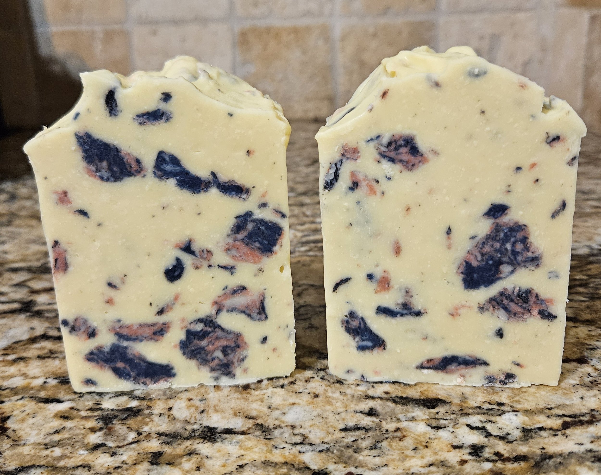 Handmade Natural soap bars on granite countertop