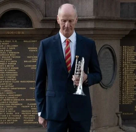 Traditional bugler enhancing memorial service atmosphere