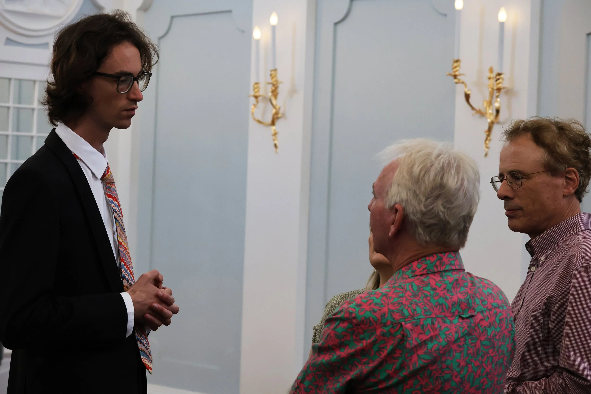 pictured in conversation with Kym Clayton & Graham Strahle at the Baroque Hall, North Adelaide (2025)