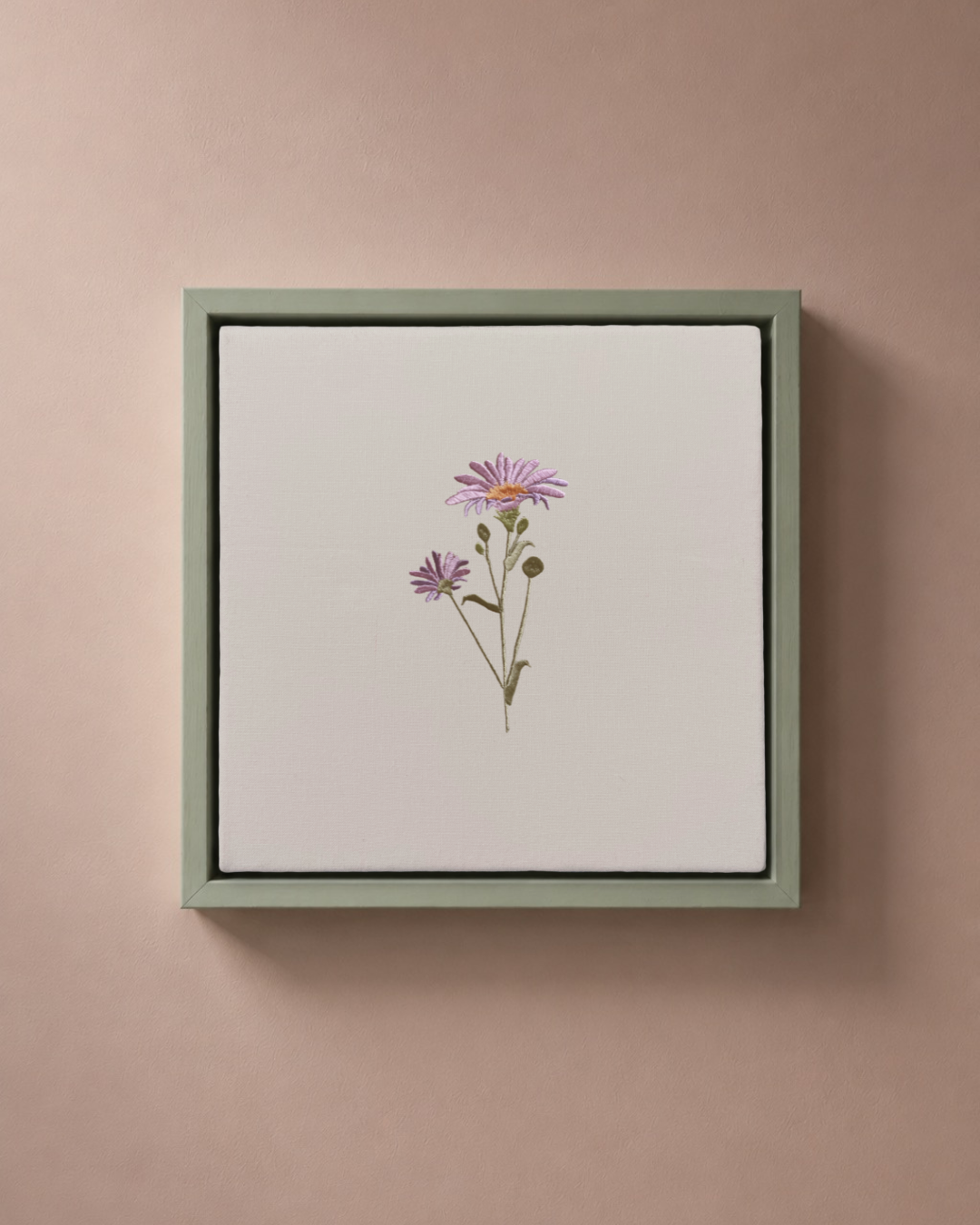 Aster September birth flower canvas featuring botanical embroidery in a sage green frame.