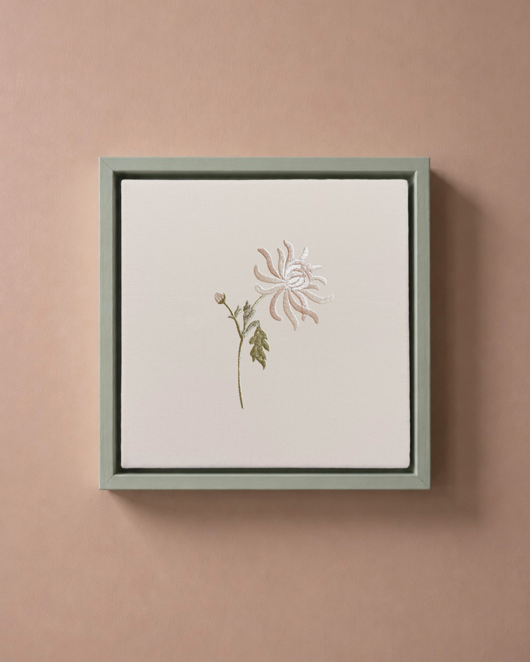 Chrysanthemum November birth flower canvas featuring botanical embroidery in a sage green frame.