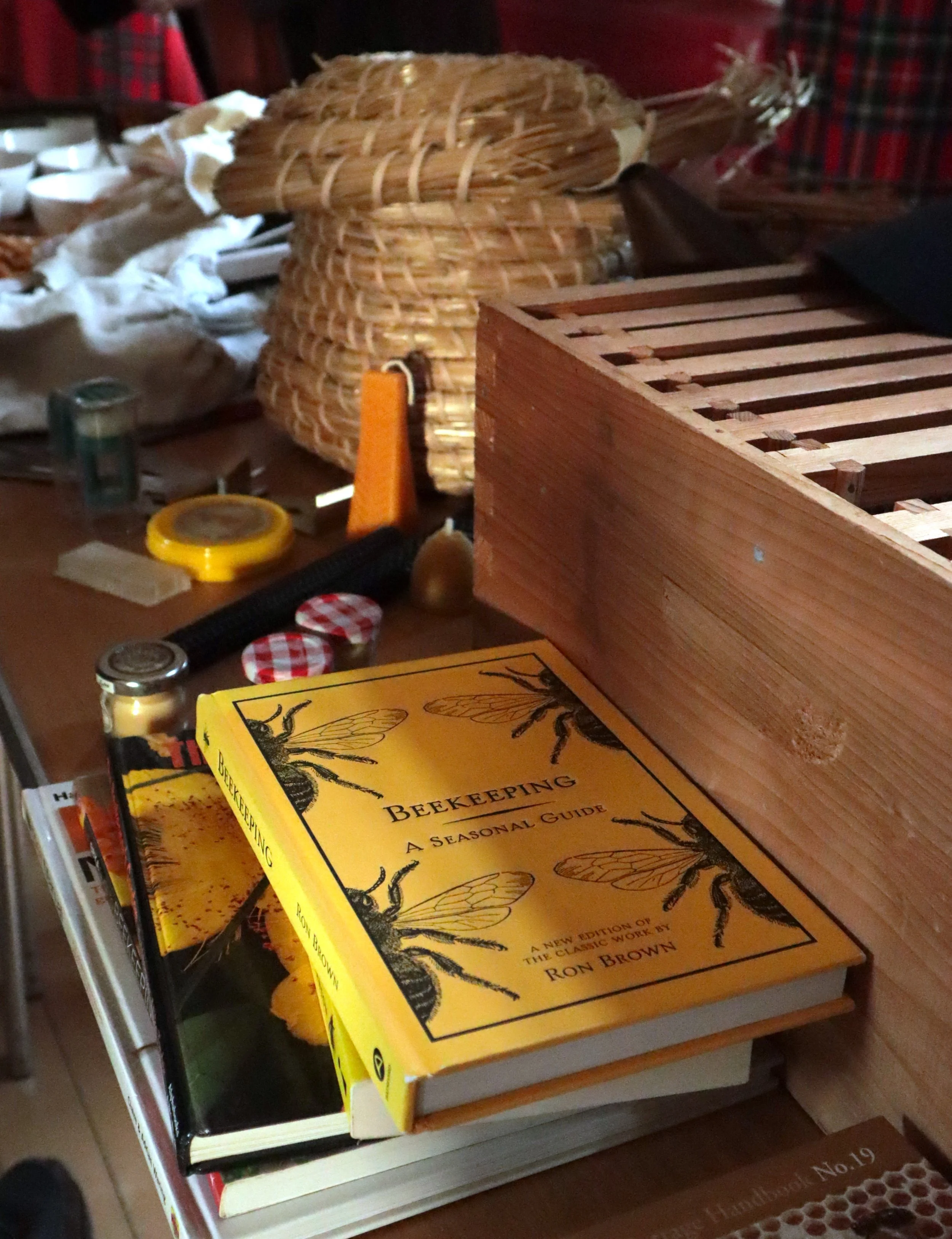 A book on beekeeping and a skep