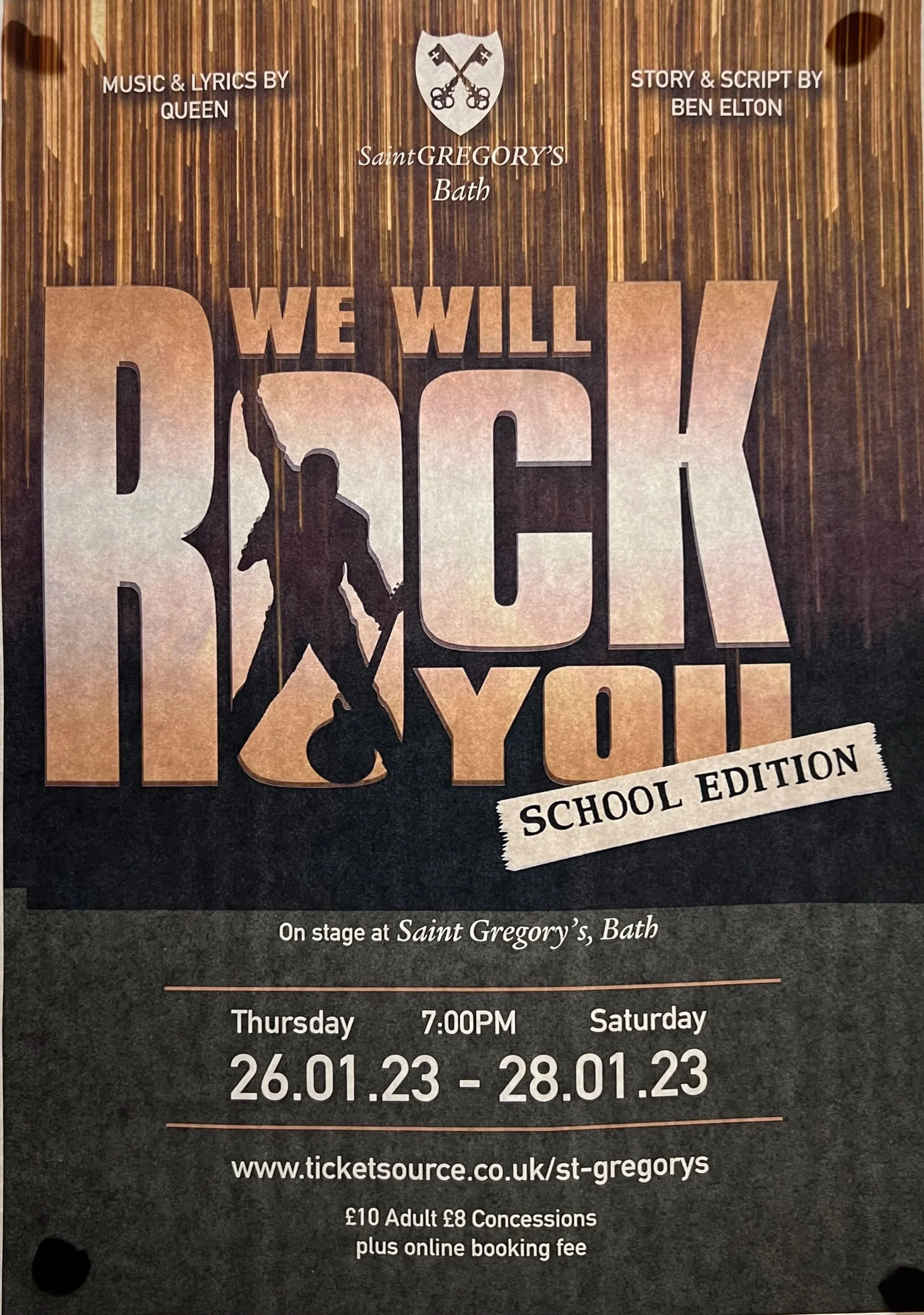 Poster for the school edition of 'We Will Rock You' at Saint Gregory's Bath. Playing from January 26 to January 28, 2023, on stage at Saint Gregory's, Bath, at 7:00 PM. Features music and lyrics by Queen and story and script by Ben Elton. Contains a 