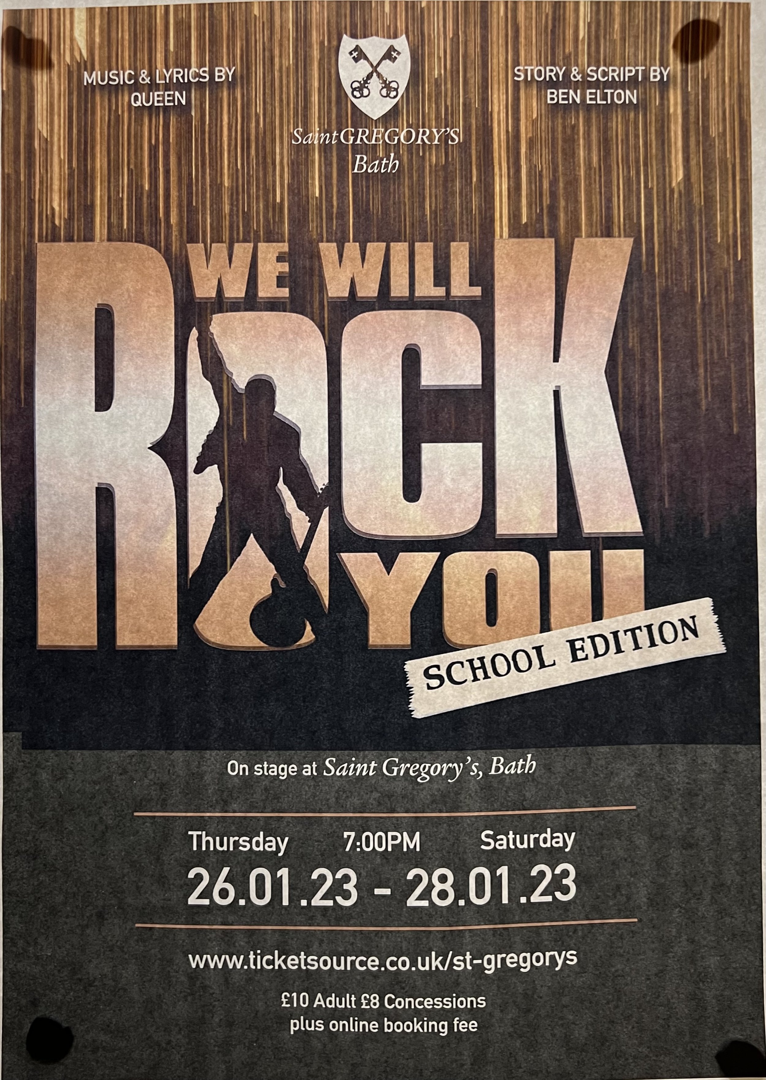 Poster for the school edition of 'We Will Rock You' at Saint Gregory's Bath. Playing from January 26 to January 28, 2023, on stage at Saint Gregory's, Bath, at 7:00 PM. Features music and lyrics by Queen and story and script by Ben Elton. Contains a 
