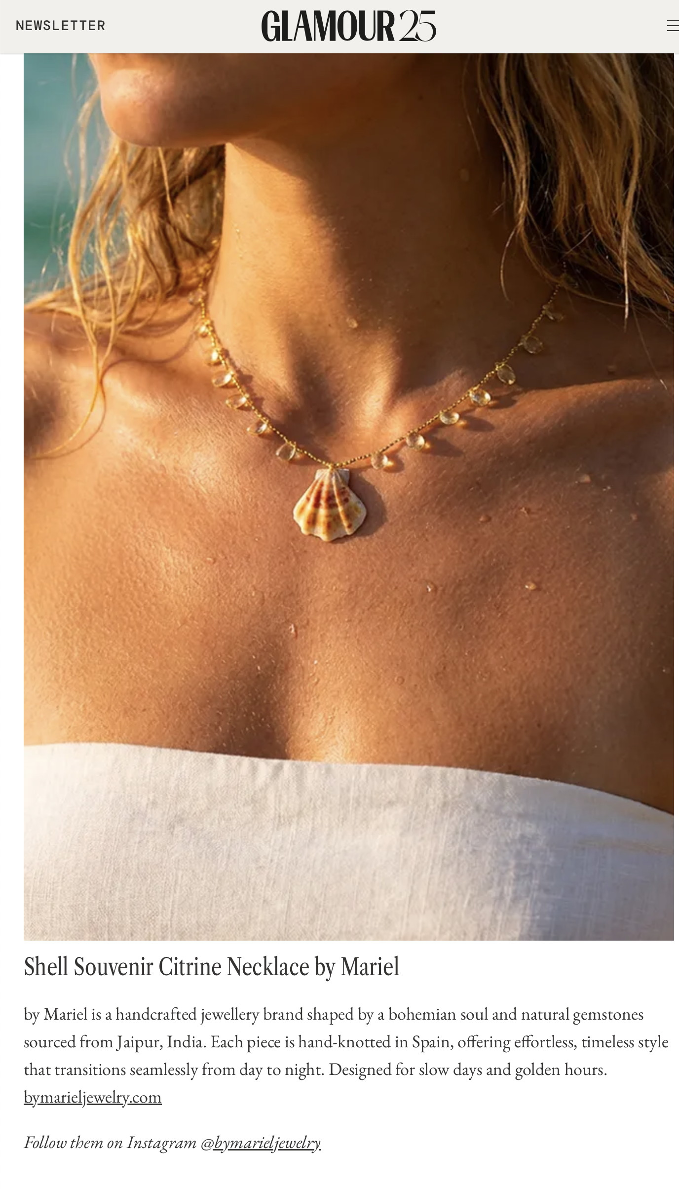 Close-up photo of a woman's neck and upper chest wearing a gold necklace with citrine and a shell pendant. Her skin is sun-kissed, and she has wavy, light brown hair.