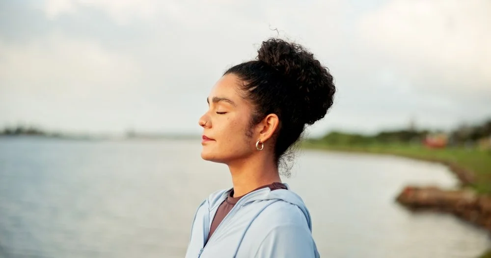 Women taking a deep breath