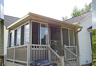 Custom installed railings and columns outside a room.